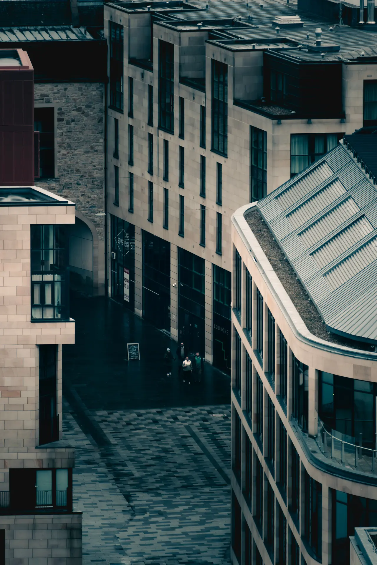 Moody Edinburgh street with historic and modern architecture